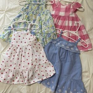 Bundle of Four Little Me Dresses